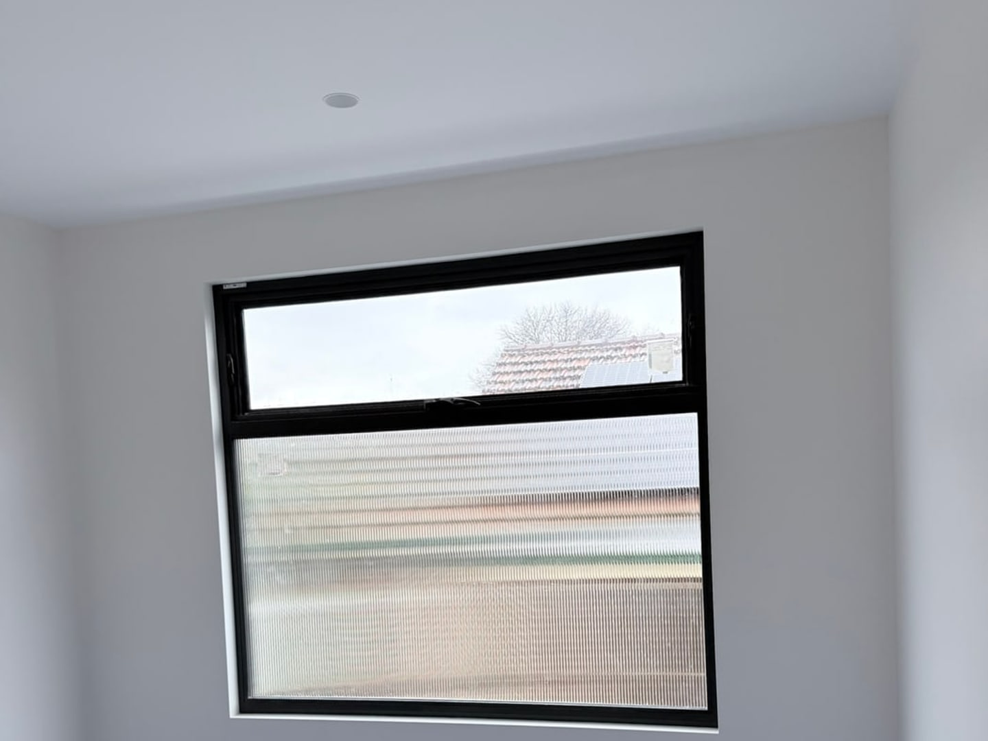 Protected floor and packaging residue in a near-complete room